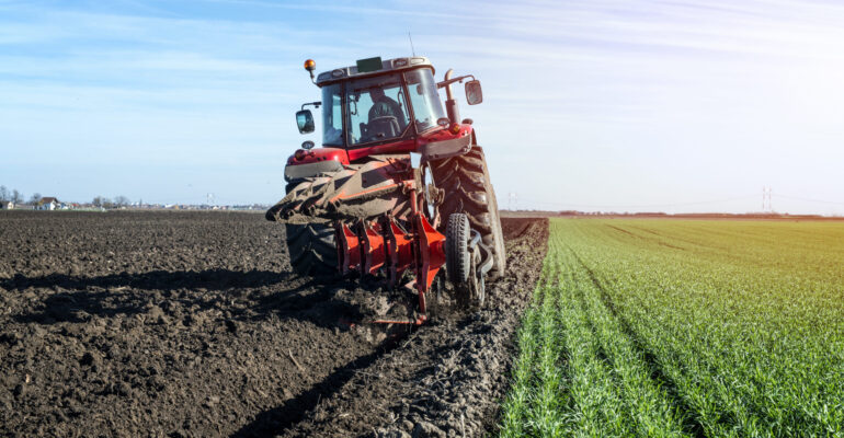 tractor-agricultural-machine-cultivating-field